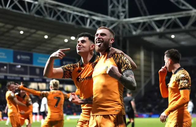 Hull City players celebrate at Preston