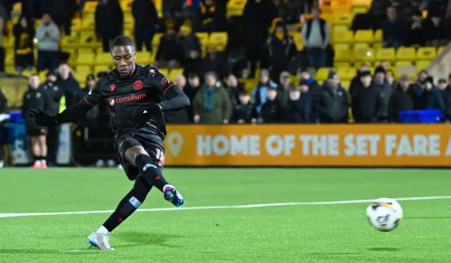 St Mirren's Malik Dijksteel scores the winning penalty in the shootout