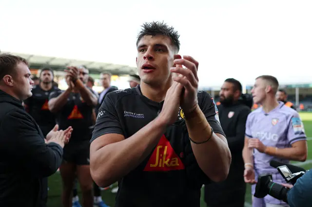 Dafydd Jenkins applauds Exeter fans