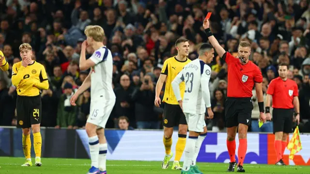 Referee gives a red card