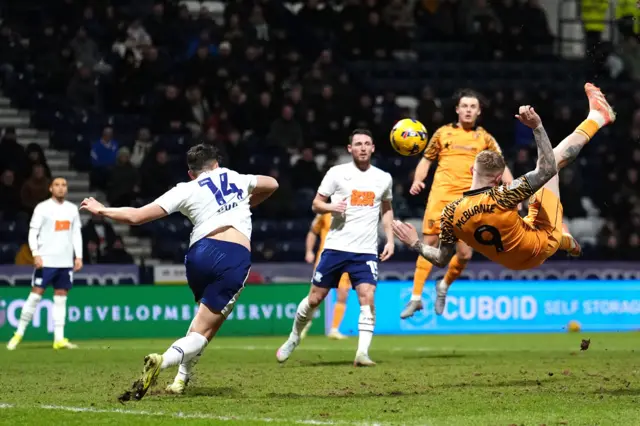 Oli McBurnie scores Hull's third goal at Preston