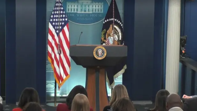 A podium at the White House with the US presidential seal on it