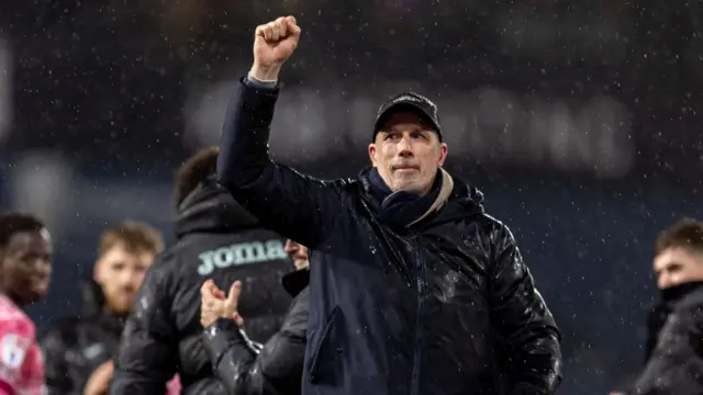 Norwich head coach Philippe Clement punches the air in celebration of his side's 5-0 win at West Brom