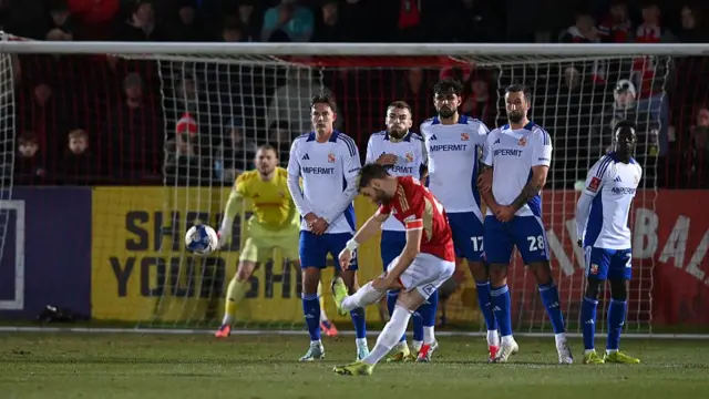 Luke Garbutt scores a free-kick