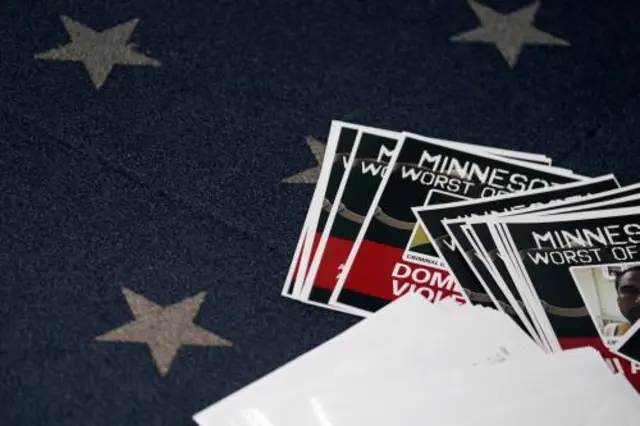A stack of printouts splayed out on a blue carpet with white stars