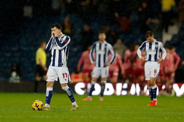 West Brom's Mikey Johnston looks dejected after West Brom concede a fourth goal against Norwich