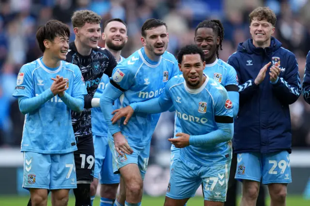 Coventry players celebrate the 2-1 win over Leicester