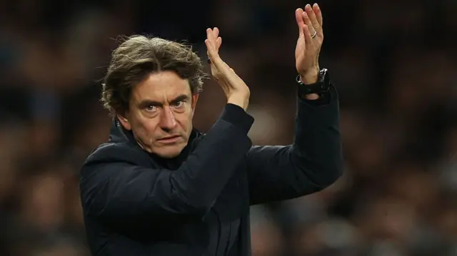 Thomas Frank clapping