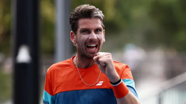 Cameron Norrie reacts