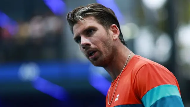 Cameron Norrie in action