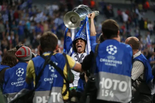 David Luiz lifting the Champions League trophy