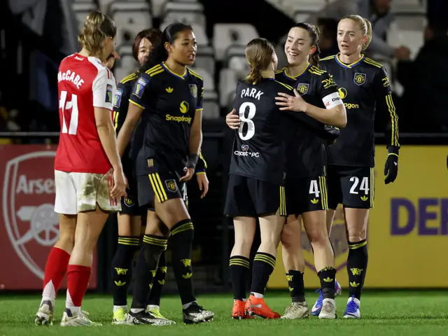 Arsenal and United players react to the full time whistle