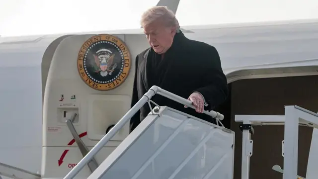 Trump departing Air Force One.
