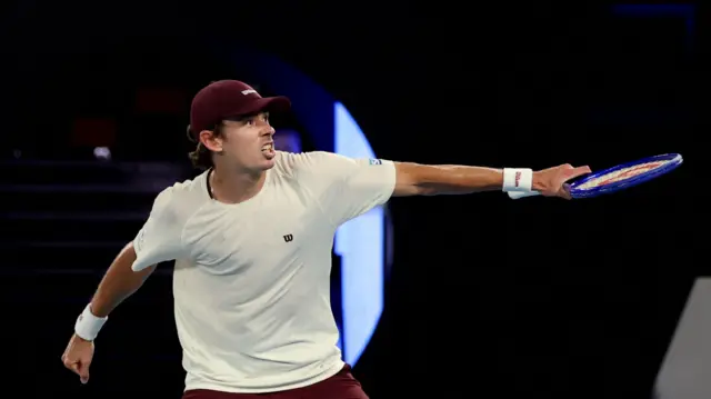 Alex De Minaur celebrates victory