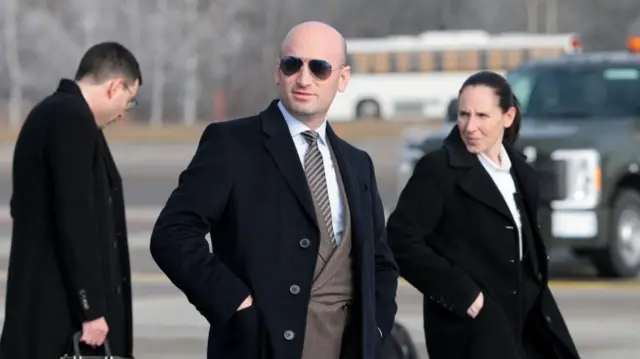 Stephen Miller on the tarmac at the airport