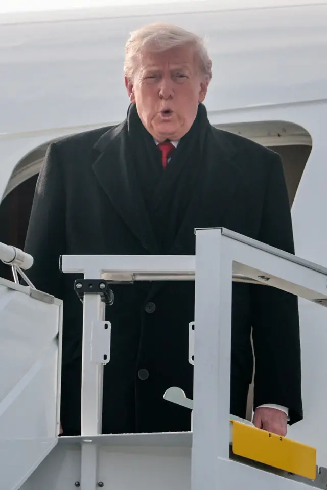 Trump departing Air Force One.