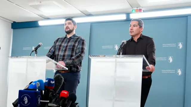 Members of Greenland's parliament Peter Borg (L) and Aqqaluaq B. Egede a