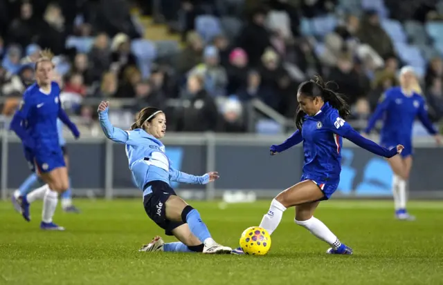 Manchester City's Yui Hasegawa and Chelsea's Alyssa Thompson battle for the ball
