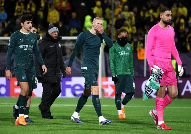 Erling Haaland with his hand over his mouth