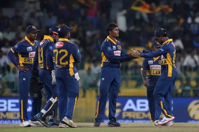 Jeffrey Vandersayof Sri Lanka celebrates the wicket of Ben Duckett (not in picture) of England with teammates