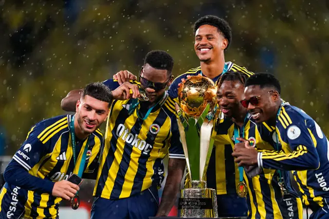 Oguz Aydin of Fenerbahce, Jhon Duran of Fenerbahce, Jayden Oosterwolde of Fenerbahce, Dorgeles Nene of Fenerbahce, and Anthony Musaba of Fenerbahce pose with the trophy
