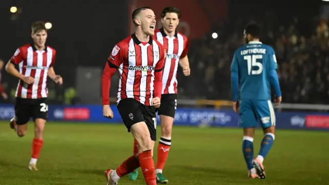 Jack Moylan celebrates scoring for Lincoln