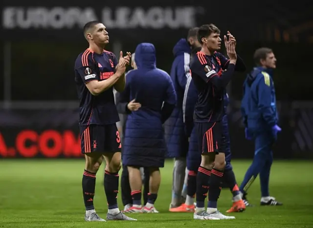 Nikola Milenkovic and teammates applaud at the end