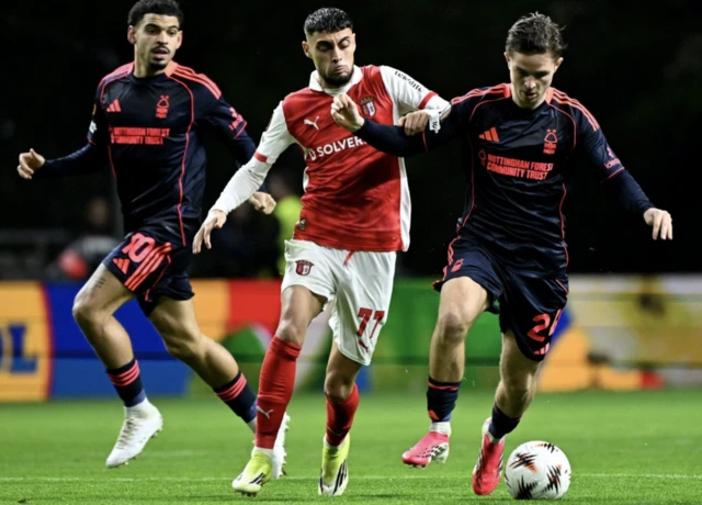 Nottingham Forest's James McAtee (right) and Sporting Braga's Gabriel Martinez (centre) battle for the ball