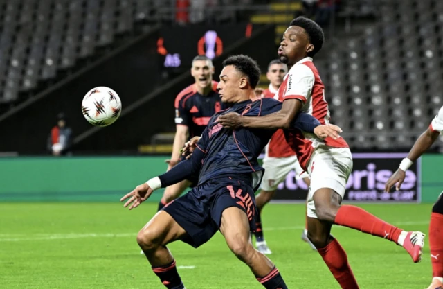 Nottingham Forest's Dan Ndoye and Sporting Braga's Jean-Baptiste Gorby battle for the ball