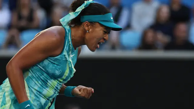 Naomi Osaka celebrates