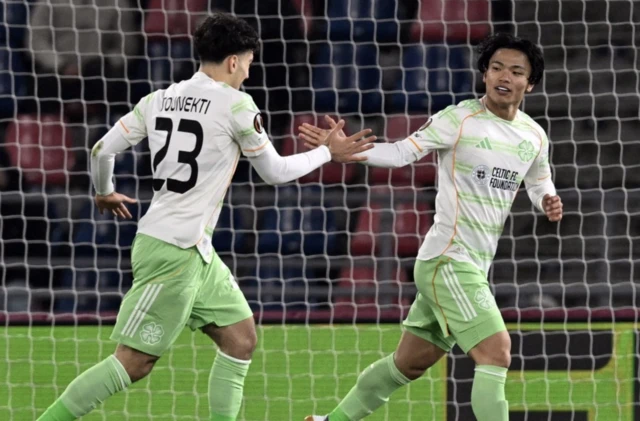 Reo Hatate celebrates
