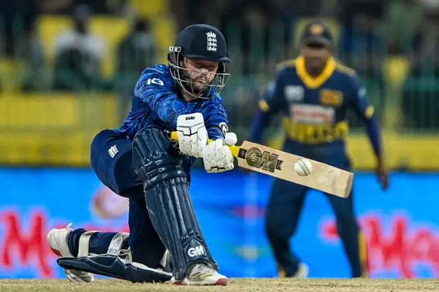 England's Ben Duckett plays a shot