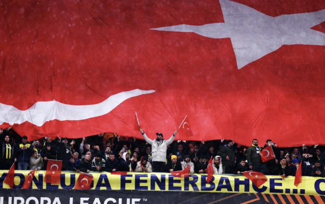 A large flag of Turkey is pictured inside the stadium