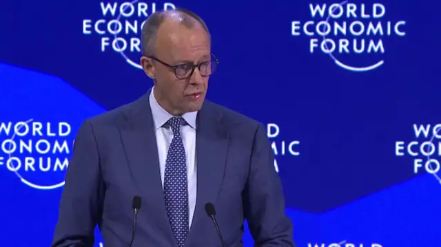 Merz giving a speech in Davos