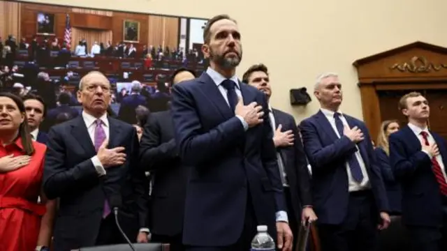 Former Special Counsel Jack Smith pledges allegiance as he testifies before the House Judiciary Committee about his criminal investigation of U.S. President Donald Trump