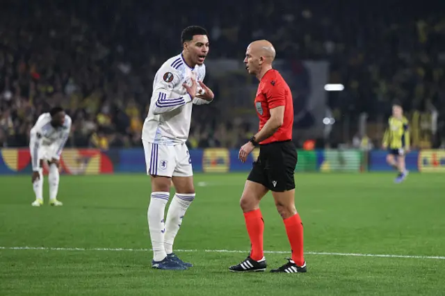 Morgan Rogers of Aston Villa reacts at Referee Luis Miguel Branco Godinho