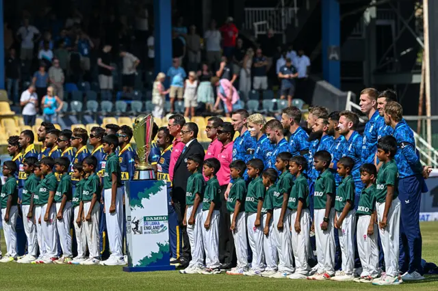 Teams at the national anthem