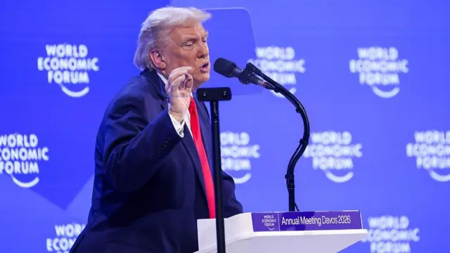 President Trump speaking at a podium at the World Economic Forum in front of a microphone and a teleprompter, Caption: President Trump mentioned Iceland four times during his speech at the World Economic Forum
