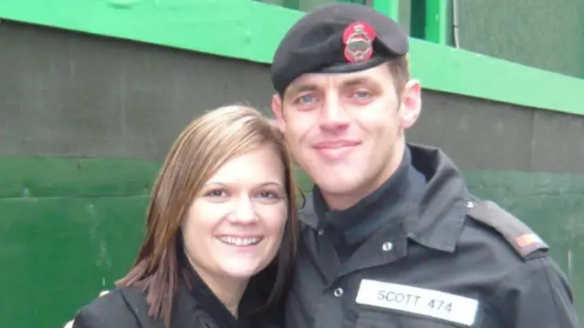 Army widow and charity founder Nikki Scott (L) is pictured with her late husband Lee (R) on parade in London, 2007