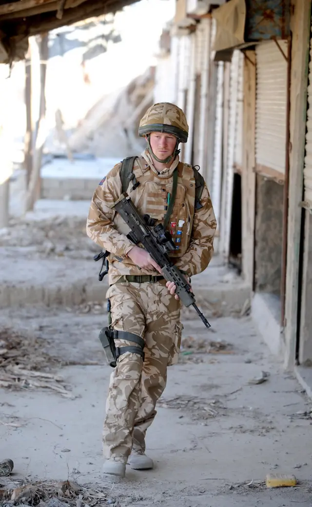 Prince Harry patrols through the deserted town of Garmisir on January 2, 2008 in Helmand Province