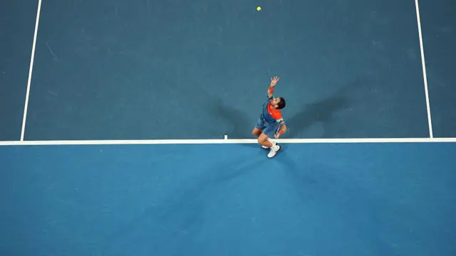 Cameron Norrie serves