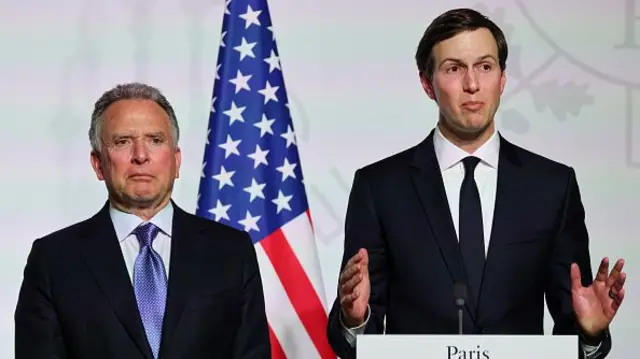 Steve Witkoff and Jared Kushner stand at a podium