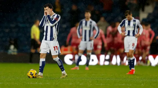 West Brom's Mikey Johnston and his team-mates look dejected after conceding in the 5-0 defeat at home to Norwich