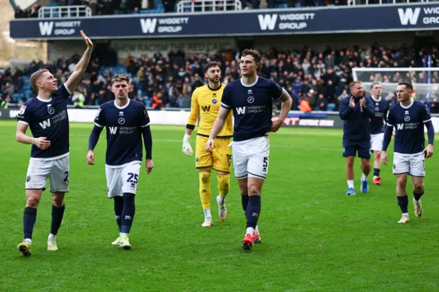 Millwall players celebrate after the win over Charlton