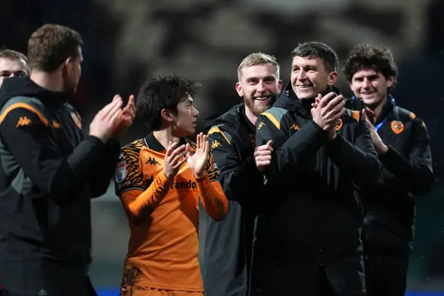 Hull boss Sergej Jakirovic celebrates with his players after the 3-0 win at Preston