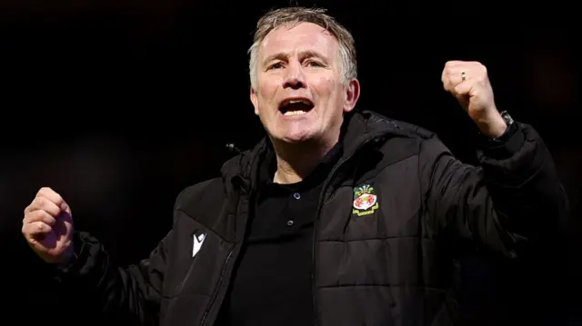 Wrexham boss Phil Parkinson celebrating their win at QPR