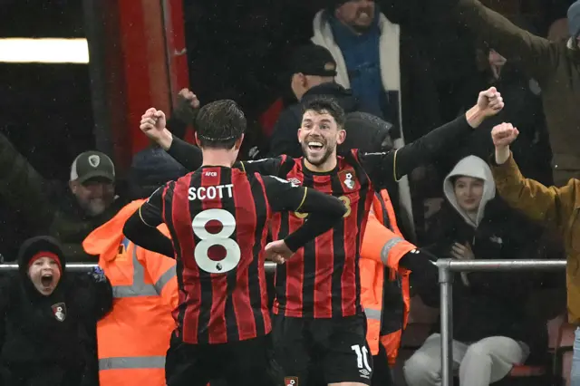 Ryan Christie (R) and Bournemouth's English midfielder #08 Alex Scott (L) celebrate their late winner