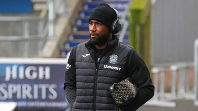 Hibs' Junior Hoilett arrives at Falkirk Stadium