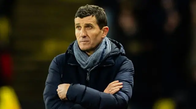 Watford boss Javi Gracia with his arms folded while watching his team in a game