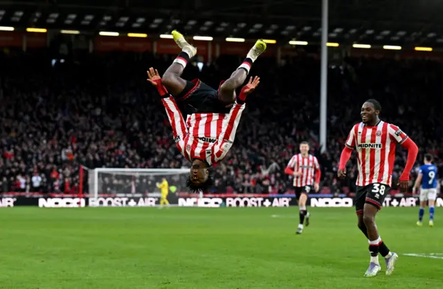 Andre Brookes celebrates with a flip